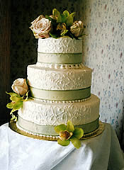 Ivory and green wedding cake.