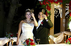 Bride and groom toasting.