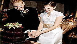 Bride and groom cutting cake at Lake Arrowhead wedding.