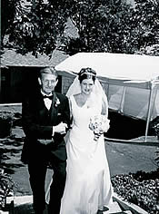 black and white photo of bride with father.